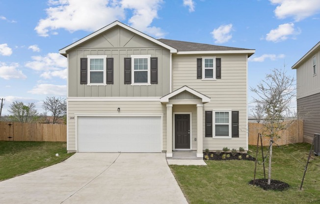 a new home with a large yard at Beacon at Presidential Heights, Manor, TX 78653