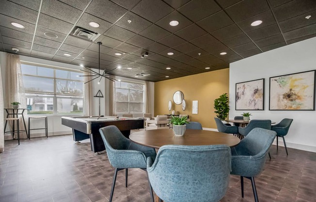 a conference room with a ping pong table and chairs at CityView, North Kansas City, MO