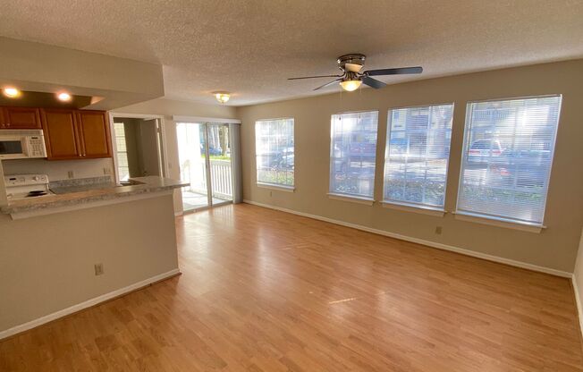 2br/2ba Tradewinds Condo with Wood Floors & W/D!