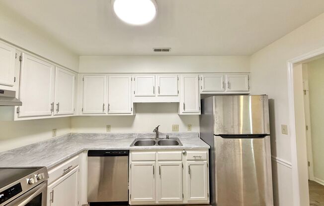 Newly Remodeled 3BD, 2.5BA Townhouse in Cary with Rear Deck & Convenient Access to I-440, Hwy 1, and I-40