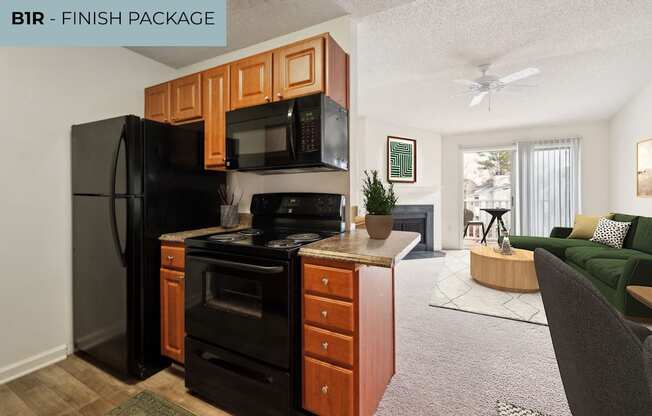 A kitchen with a black refrigerator and a black stove top oven.