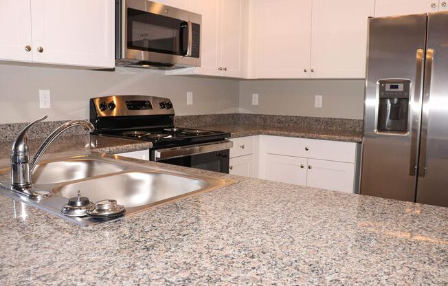 a modern kitchen with stainless steel appliances