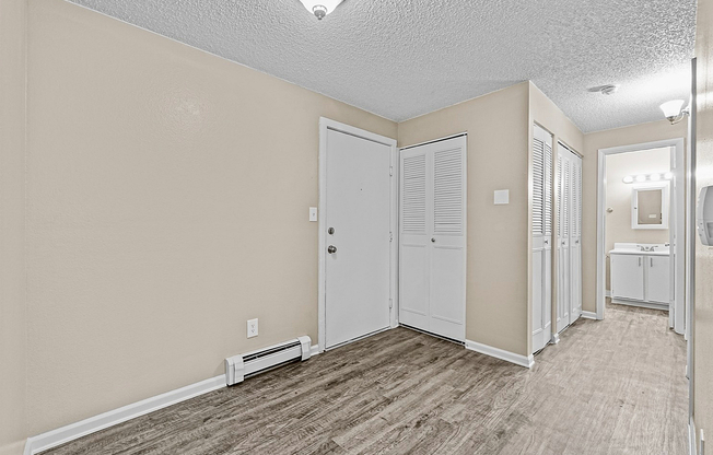 A spacious, open area that effortlessly blends form and function, this entrance sets the tone for the rest of your home.