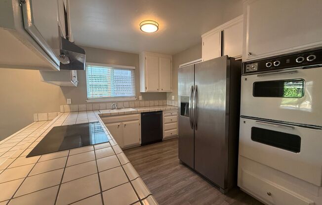 CAMPBELL - Open floor plan with separate family room, large kitchen.