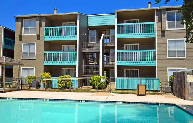 Pool with building behind it