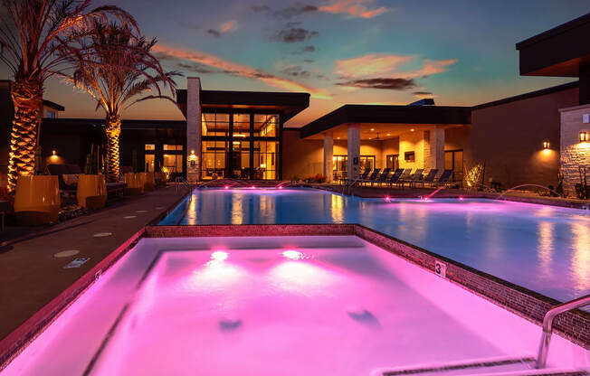 Pool Area at Night at Escape at Arrowhead's Apartments in Glendale, AZ