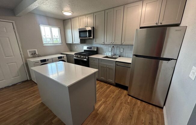 Completely Renovated Unit! 2 bedroom 1 bath with laundry and AC! - (MOVE IN SPECIAL ONLY $500 DEPOSIT) "Plus 2 Months FREEE!!!!"