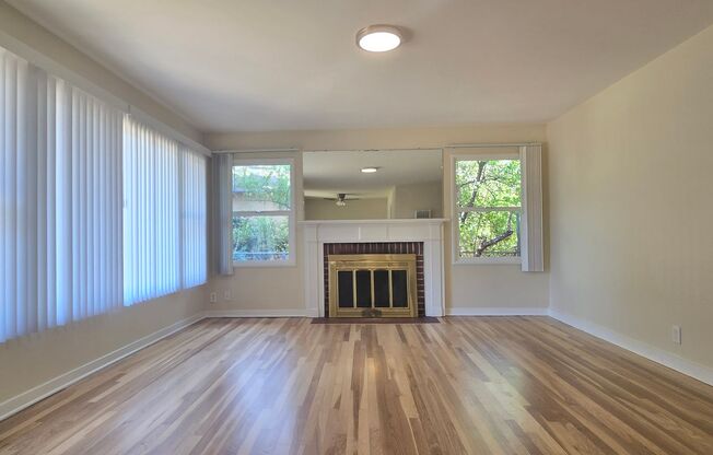 Cute Single Family Home with Large Bonus Room, Updated Kitchen, Wood Floors, Fresh Paint, Nice Yard!