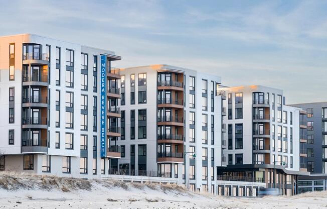 A striking coastal community with modern design set along the shoreline.