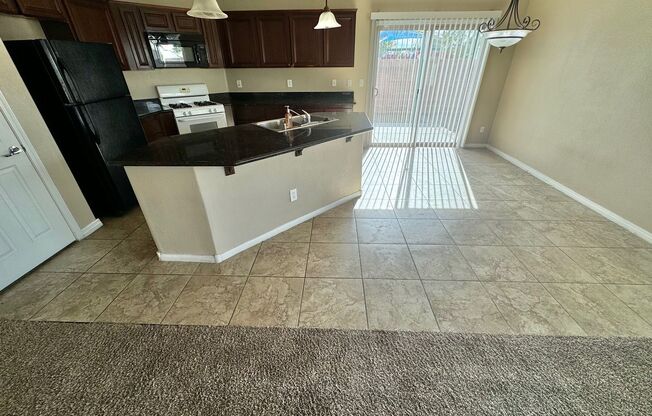 SINGLE STORY 4 BEDROOM 2 BATHROOM HOME LOCATED IN NORTH LAS VEGAS