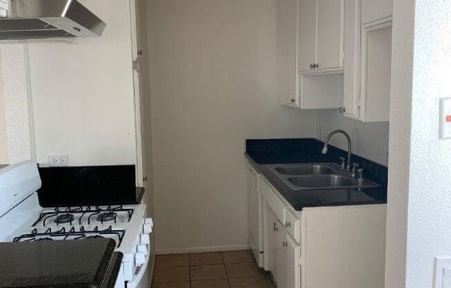 11833 GILMORE APTS.