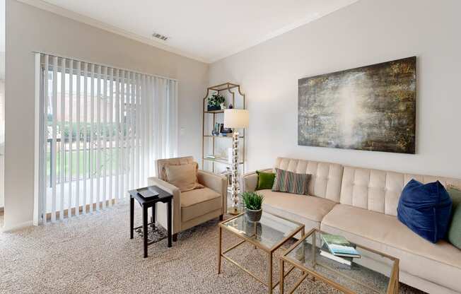 a living room with a couch and a table