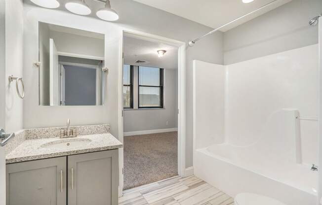 a bathroom with a sink and a bathtub