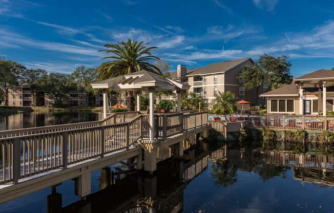 a dock with a gazebo on the water