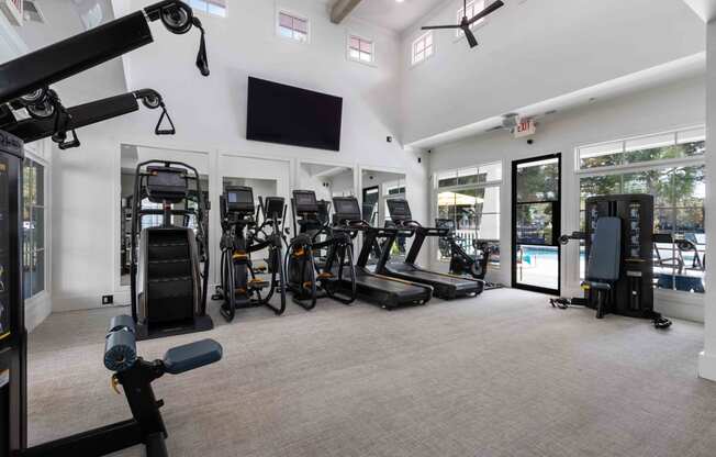 the gym is equipped with state of the art equipment including cardio machines and weights