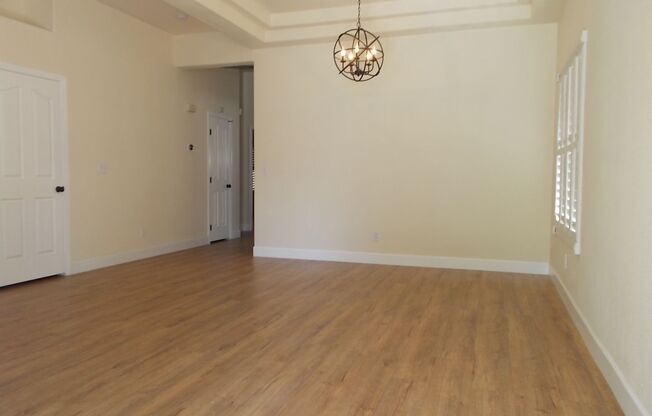 Charming Home in Gated Melrose Park Estates with Dual Fireplaces & Covered Patio