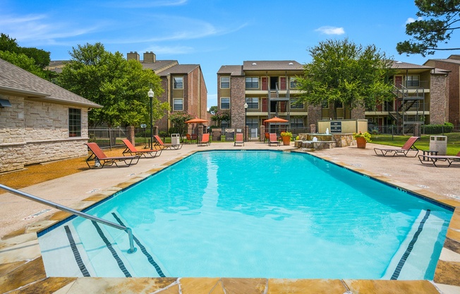 Pool and Outdoor Lounge Area  | Bookstone and Terrace Apartments | Irving, Texas
