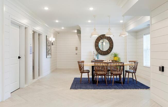 Large dining table in white lobby