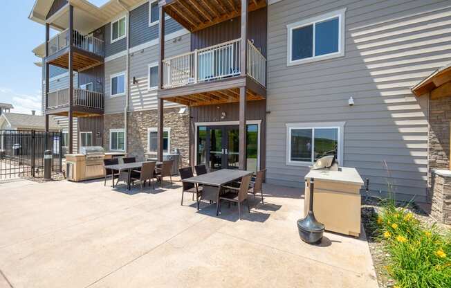 the patio at the whispering winds apartments in pearland, tx