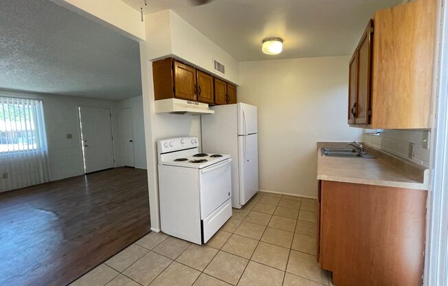 Central 2 bedroom 1 bath unit with Fenced yard.