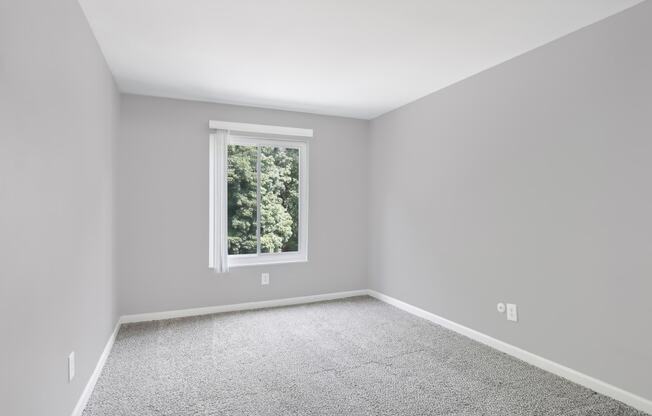 A bedroom at Magnolia Apartments