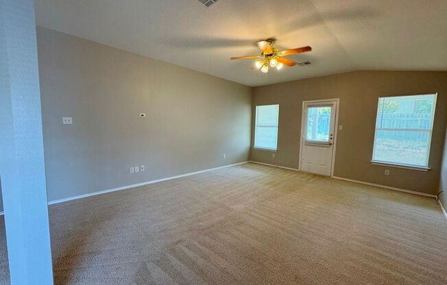 126 Salado Dr in Kyle is a charming single-story brick home nestled in the Silverado at Plum Creek community!