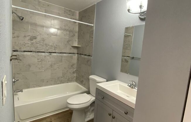 1/1 in the Heart of Brandon with a lake view!