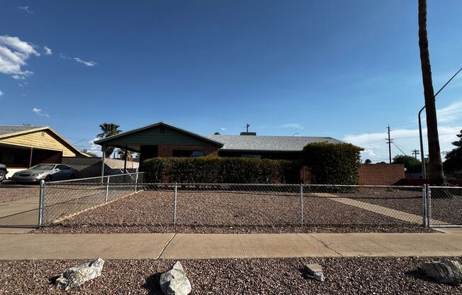 Eastside (Broadway and Wilmot) 3 bedroom, 2 bath home with large blocked yard and A/C!