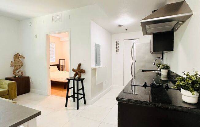 Bright and furnished 1/1 in classy remodeled Art Deco Building