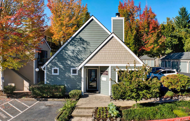 an image of a house in the middle of a garden