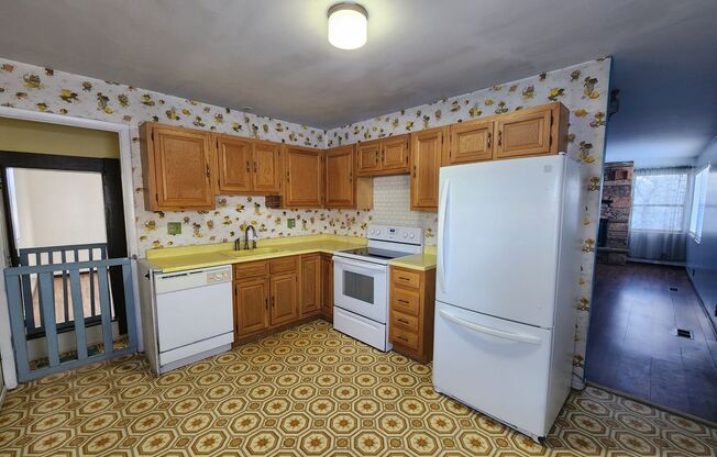 Welcome home to a 1978 time-piece with artistic splashes! 3 bd. 1.5 bath