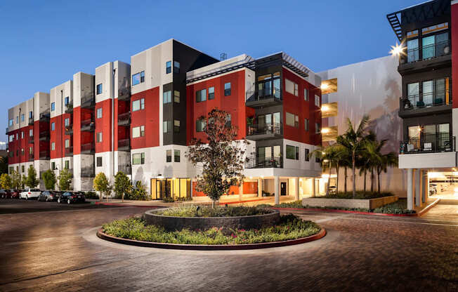 A modern building with a courtyard in the center. at Sorrel at Warner Center, Woodland Hills