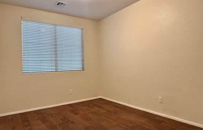 Welcome to this beautifully maintained two-story home offering 4 spacious bedrooms and 3 full bathrooms, including a convenient downstairs bedroom with its own shower—ideal for guests or multi-generational living.