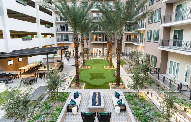 This beautifully designed courtyard offers lounge seating, a fire feature, and a putting green—ideal for relaxing or spending time with neighbors.