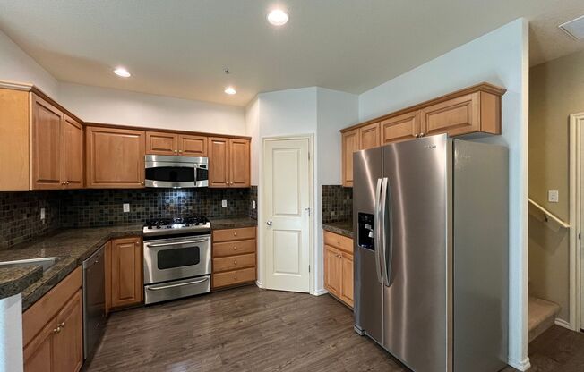 Cozy 3 Bed 2.5 Bath Townhouse in Bethany neighborhood! Attached garage and in unit washer/dryer!