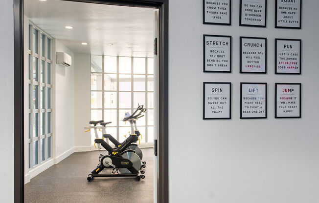 a view of a office with chairs and a door at Presidio Palms Apartments, Tucson