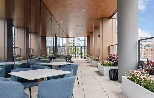 a terrace with tables and chairs and a building in the background at Cassidy on Canal, Chicago, IL, 60654