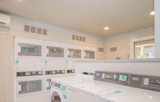 a kitchen with a sink and a microwave