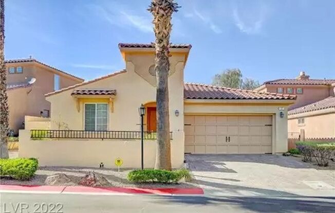 Exquisite fully furnished 2 Bed/2 Bath, Den/Office Single Story home in prestigious Lake Las Vegas. Strip and Golf Course Views