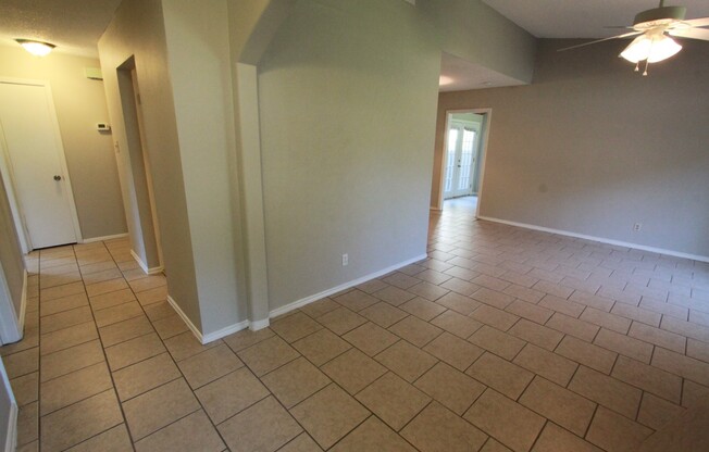 Southeast Austin Home with Vaulted Ceilings, Bonus Room & Private Backyard