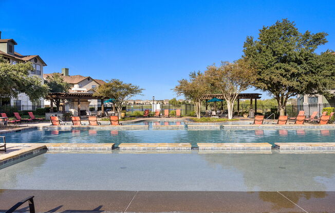 the swimming pool at the preserve at polo ridge apartments at The Fairways at Star Ranch, Hutto, Texas