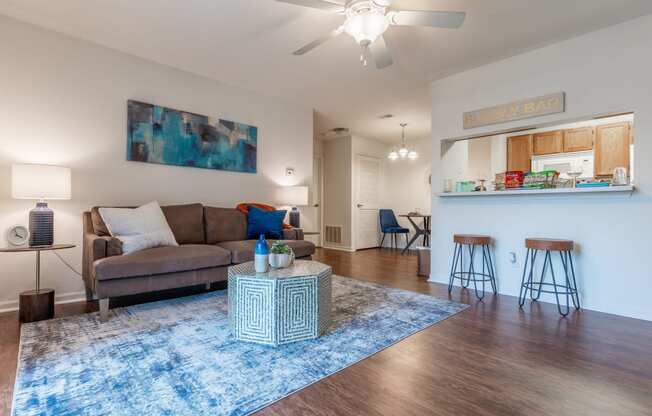 Living Room With Kitchen View at Bexley Village, Greenwood, IN, 46143