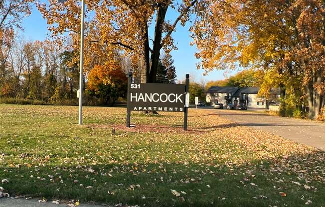 a sign that says 5th hancock apartments