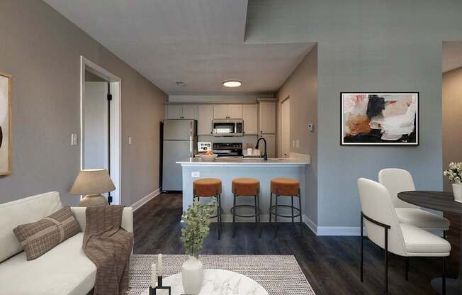 A modern kitchen with a bar stool and a white sofa.