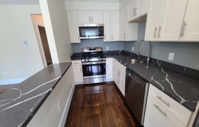 Brand new renovation - In unit Laundry - Off Street Parking