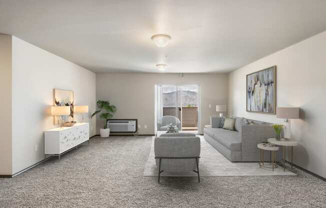 a living room with white walls and carpet  at Altitude, East Wenatchee, 98802