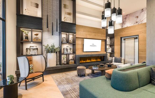 Relax fireside in this cozy and modern resident lounge, perfect for quiet mornings or unwinding with friends.