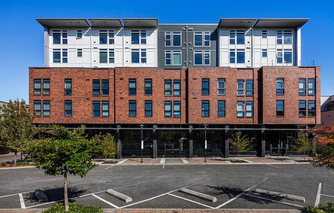 Greenwood Apartments - Exterior View of The Morrow Apartments Building with Parking Access