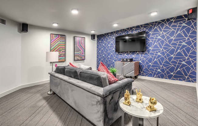 Social Lounge and Gaming Area with sofa and tv at arte apartments