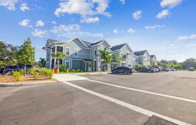 an empty parking lot in front of a row of houses  at Palm Grove, Florida, 34222